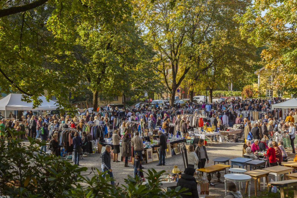 People at an outdoor flea market