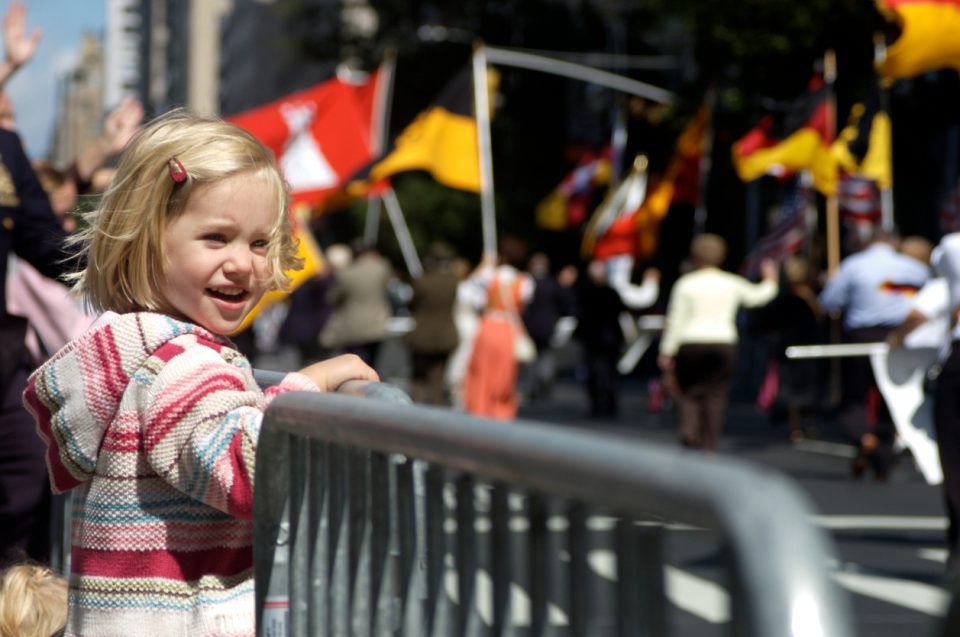 child enjoying a parade